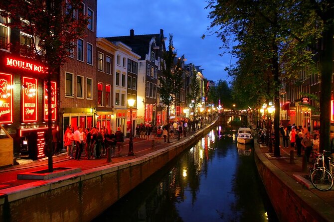 Red Light District Primetime Private Tour for 18+ Only - Oude Kerk: Amsterdam’s Oldest Church Meets a Changing Neighborhood