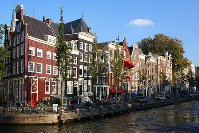 Secrets of Amsterdam Walking Tour plus Dutch Sweets Tasting - Begijnhof: When the Tour Slows Down for a Place With Meaning