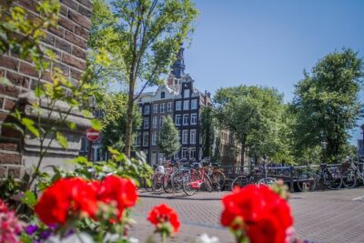 Secrets of Amsterdam Walking Tour plus Dutch Sweets Tasting - Spui Square and the Book Market Mood: A Stop With Everyday Amsterdam Energy