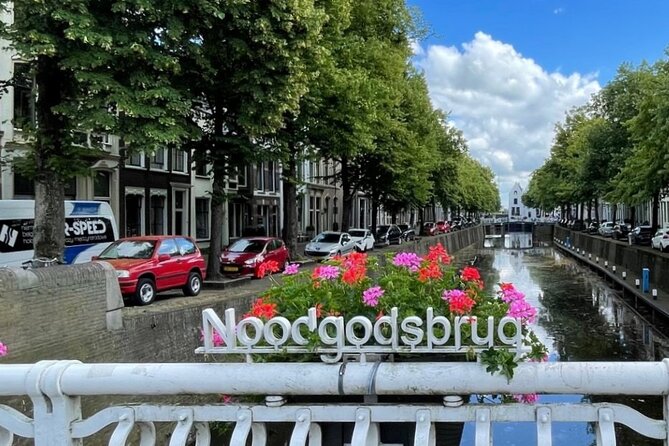 Self-Guided Walking Tour of Gouda: Canals, Colonies, and Cheese - Saint-John Church and Museum Gouda: stained glass and a calmer courtyard pause