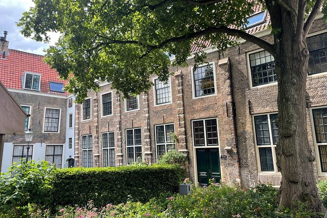 Self-Guided Walking Tour of Gouda: Canals, Colonies, and Cheese - Lage Gouwe stumbling stones and Park Houtmansplantsoen: remembering built into the walk