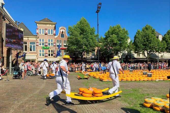 Small Group Alkmaar Cheese Market and City Tour <em>English</em> – Key highlights worth waking up early for’ /></p>
<ul>
<li><strong>Small group (max 6)</strong> means you’re not glued to a headset script.</li>
<li><strong>Prime viewing at the Kaasmarkt</strong> is a strong theme, thanks to Jennifer’s local connections.</li>
<li><strong>Hands-on understanding</strong> of how cheese is traded, weighed, and carried in the old tradition.</li>
<li><strong>Medieval center walk</strong> with passes by Grote Sint Laurenskerk, Stadhuis, and the Waag.</li>
<li><strong>Cheese samples and optional purchases</strong> help you leave with something real, not just photos.</li>
</ul>
<h2 id="why-alkmaars-cheese-market-still-feels-medieval">Why Alkmaar’s cheese market still feels medieval</h2>
<p><img width="669" height="446" decoding="async" src=