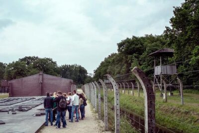 Small Group Tour to Nazi WWII concentration camp from Amsterdam - First stop inside the memory: watchtowers, barracks, crematorium, and the children’s memorial