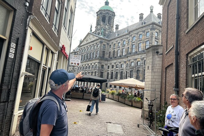 Small Group Walking Tour in Amsterdam with Friendly and Fun Guide - Dam Square as your starting point: a smart way to get oriented