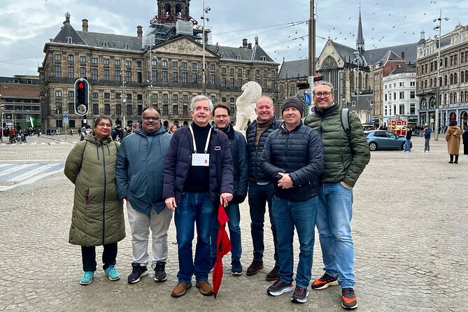 Small Group Walking Tour in Amsterdam with Friendly and Fun Guide - Old center to Waag and back toward Dam Square: stories in the tight streets