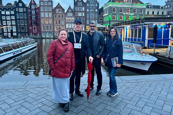 Small Group Walking Tour in Amsterdam with Friendly and Fun Guide - Dam Square & Damstraat: from a fishing village to the main stage