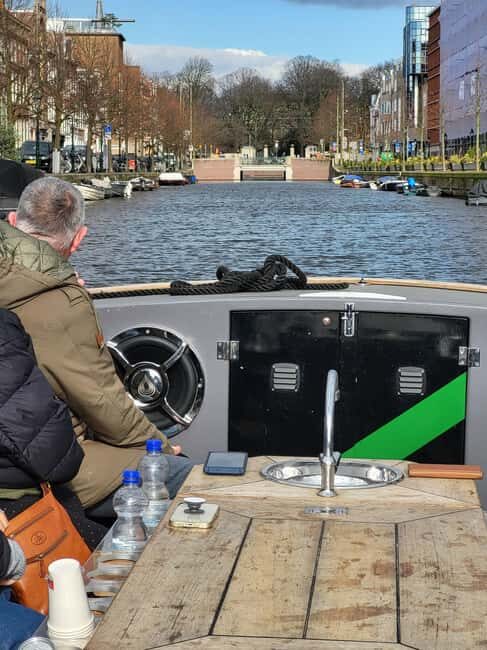 The Hague: Canal Cruise with Live Guide Winter edition - Royal Stables and the royal-neighborhood feel up close