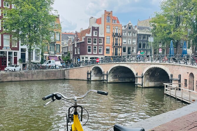The Original Bike Tour of Amsterdam Highlights and Hidden Streets - Rijksmuseum area: exterior learning without committing to a ticket
