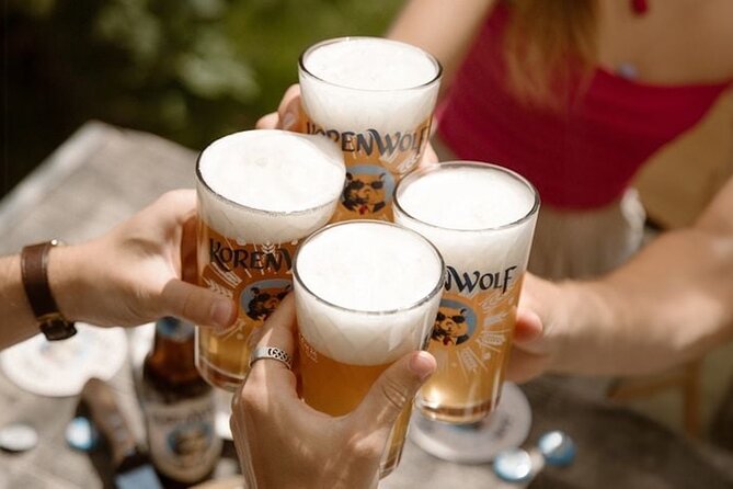 Top 10 Tastes of Amsterdam: Food & Culture Bike Tour - The quick stop that keeps the tour feeling Dutch: kruidenbitter shot
