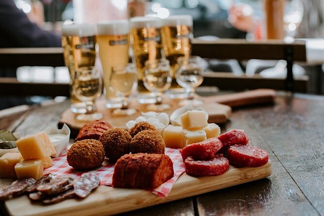 Top 10 Tastes of Amsterdam: Guided Walking Food Tour - Haarlemmerdijk Tastes: Raw Herring and Crispy Cod Bites