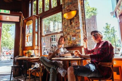 Treasures of Amsterdam: Coffeeshops & Red Light District Private Tour - Warmoesstraat and the street-level “Amsterdam logic”