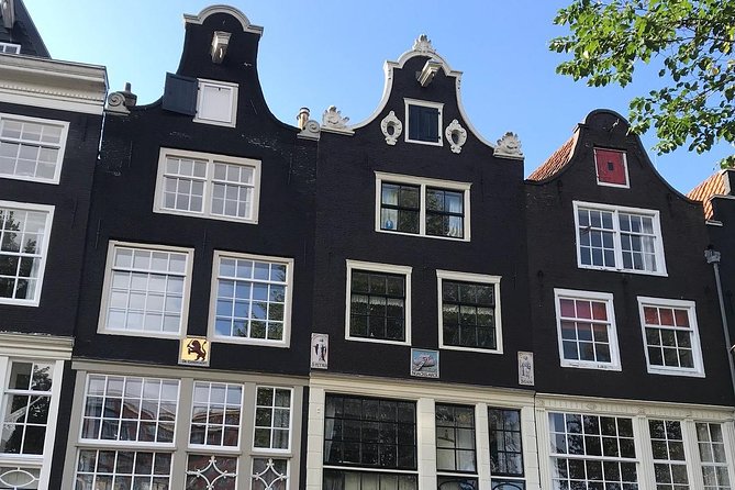 Urban Adventures Amsterdam Bike Tour, Graffiti and Magnet Fishing - Westerpark and Prinseneilandsgracht: green paths and a drawbridge that earns its hype