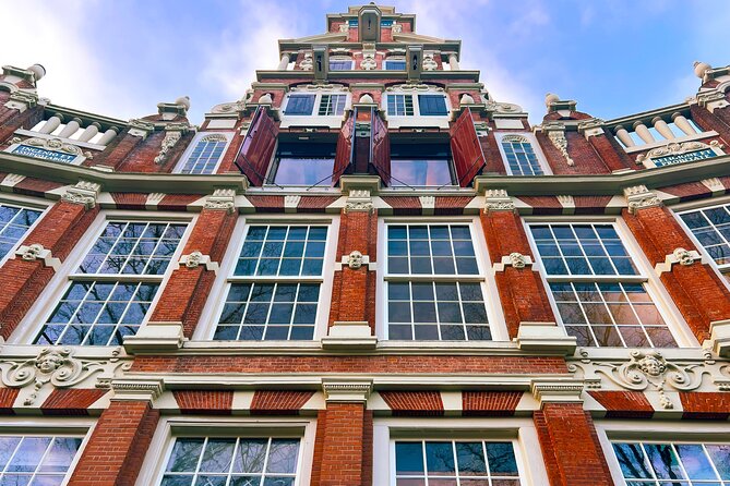 Walking Tour about Golden Age Architecture, private local guide - Torensluis and the Four Golden-Age Façades: Crooked Houses and Creative Adaptation